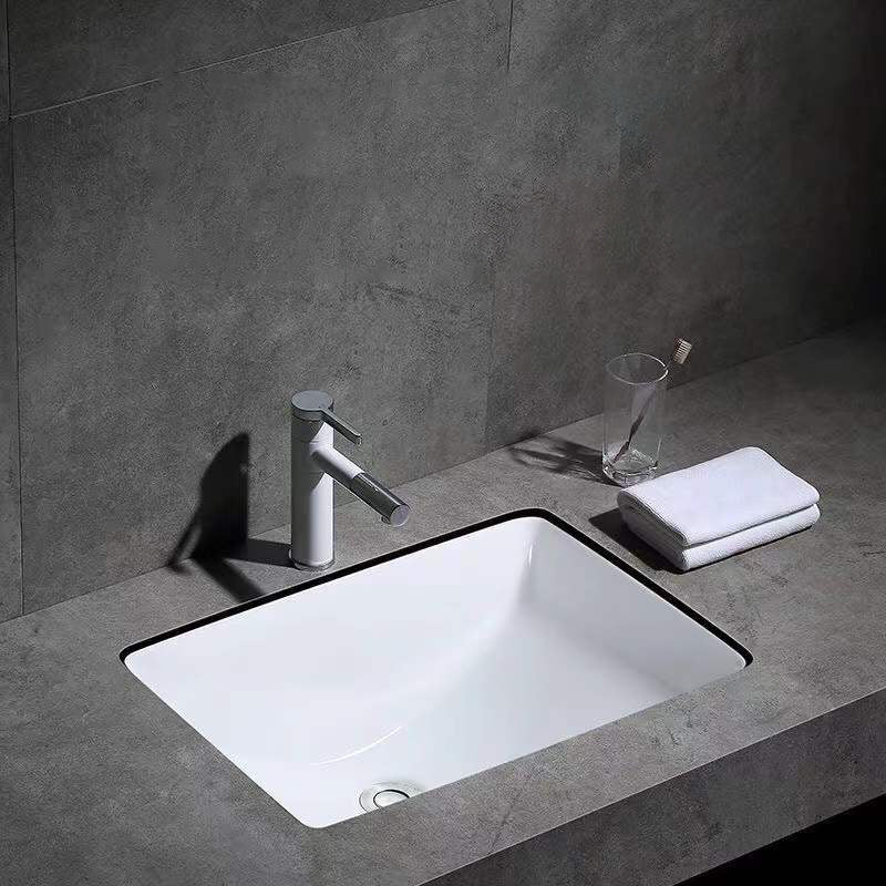Stylish Undermount Oval Ceramic Sink with Pop-Up Drain
