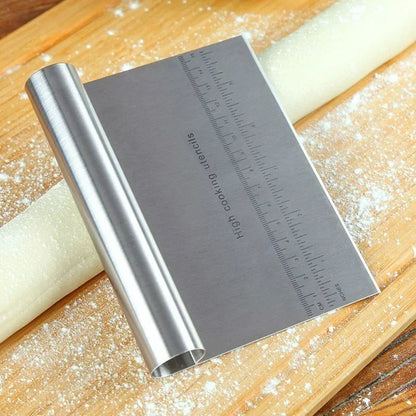 https://cdn.shopify.com/s/files/1/0798/6180/9481/files/FormedEdge___Versatile_Stainless_Steel_Pastry_Spatula___Dough_Scraper_4.jpg