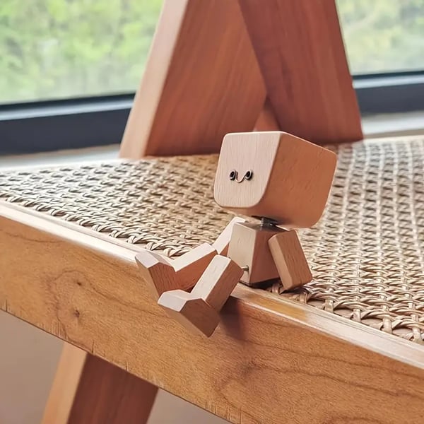 Handcrafted Wooden Rocking Figurine with Changeable Faces