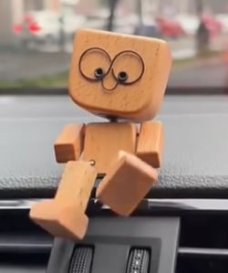 Handcrafted Wooden Rocking Figurine with Changeable Faces