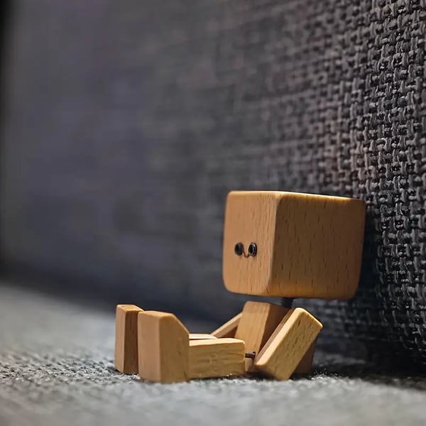 Handcrafted Wooden Rocking Figurine with Changeable Faces