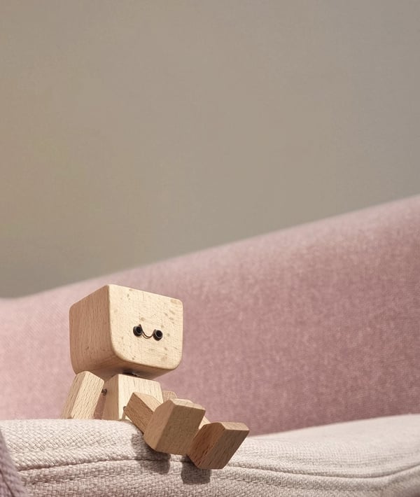Handcrafted Wooden Rocking Figurine with Changeable Faces