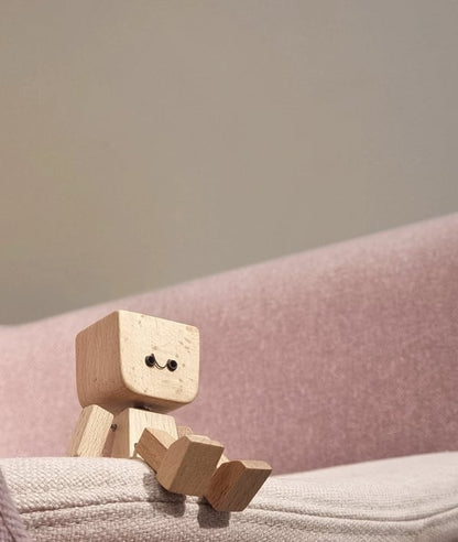 Handcrafted Wooden Rocking Figurine with Changeable Faces