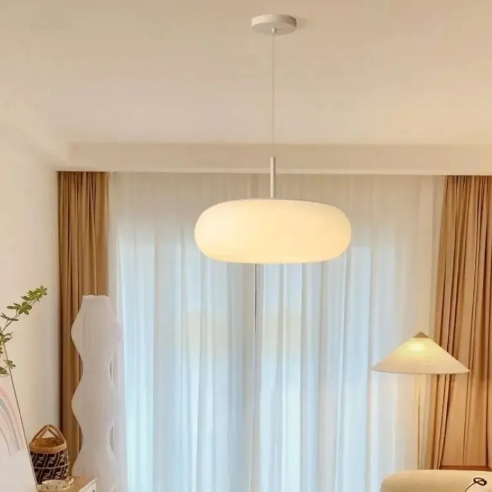Elegant White Pendant Light with Soft LED Glow