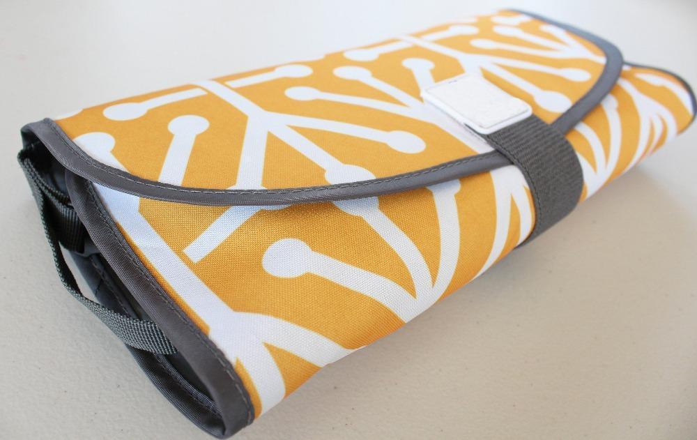 Portable 3-in-1 Changing Pad with Sanitizer