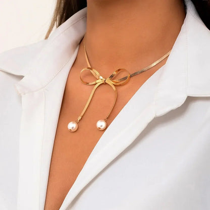 Delicate Patterned Pearl Bow Necklace