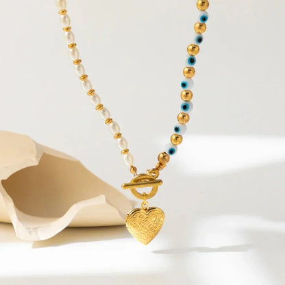 Lucky Eye Freshwater Pearl Heart Pendant Necklace