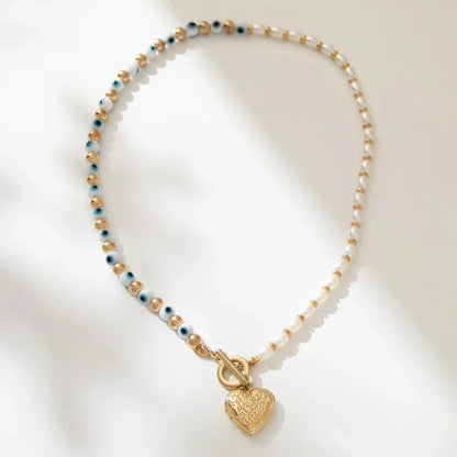 Lucky Eye Freshwater Pearl Heart Pendant Necklace