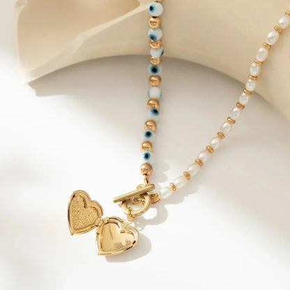 Lucky Eye Freshwater Pearl Heart Pendant Necklace