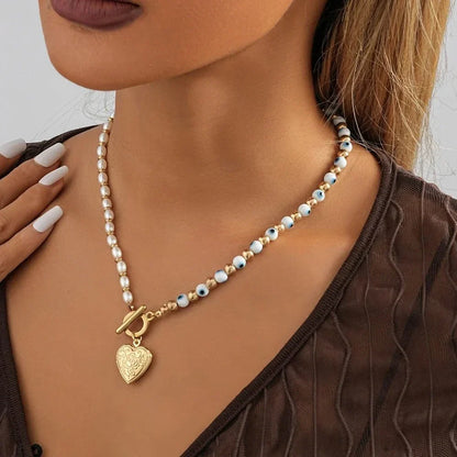 Lucky Eye Freshwater Pearl Heart Pendant Necklace