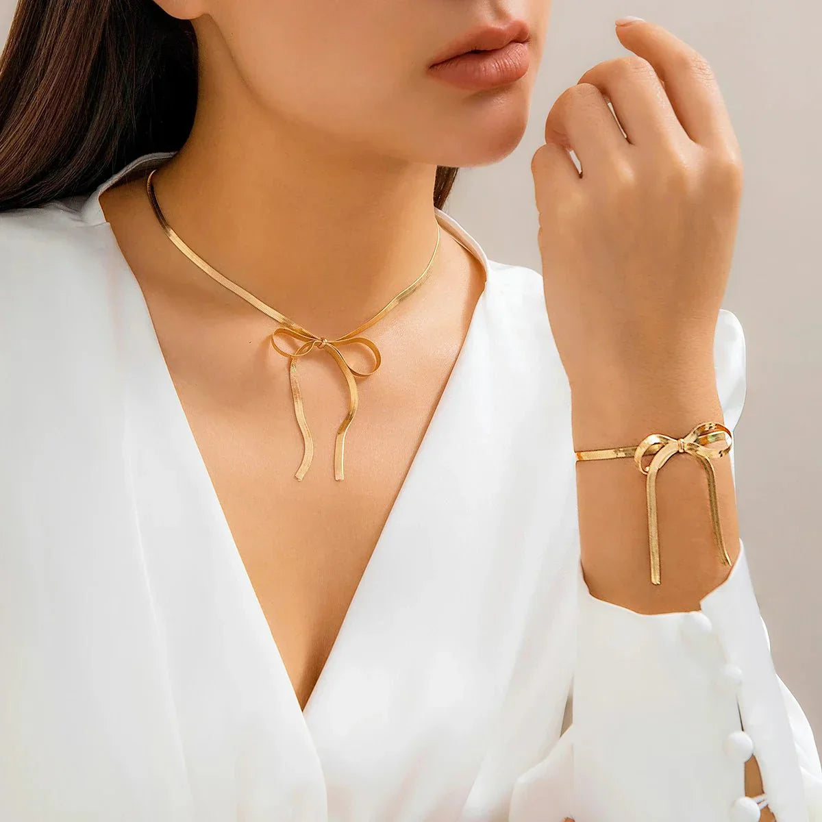 Elegant Chain Bow Necklace and Bangle Set