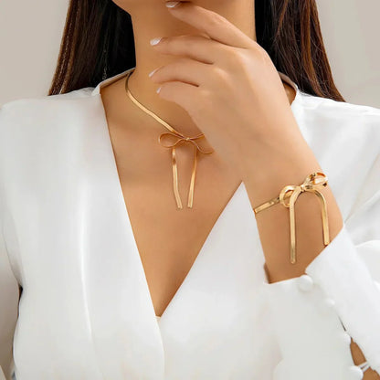 Elegant Chain Bow Necklace and Bangle Set