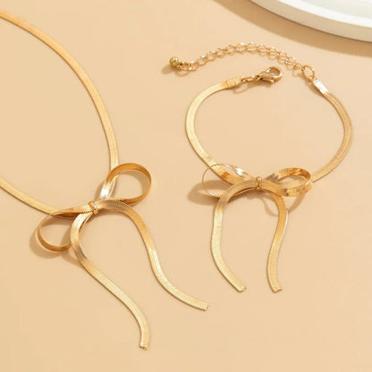 Elegant Chain Bow Necklace and Bangle Set