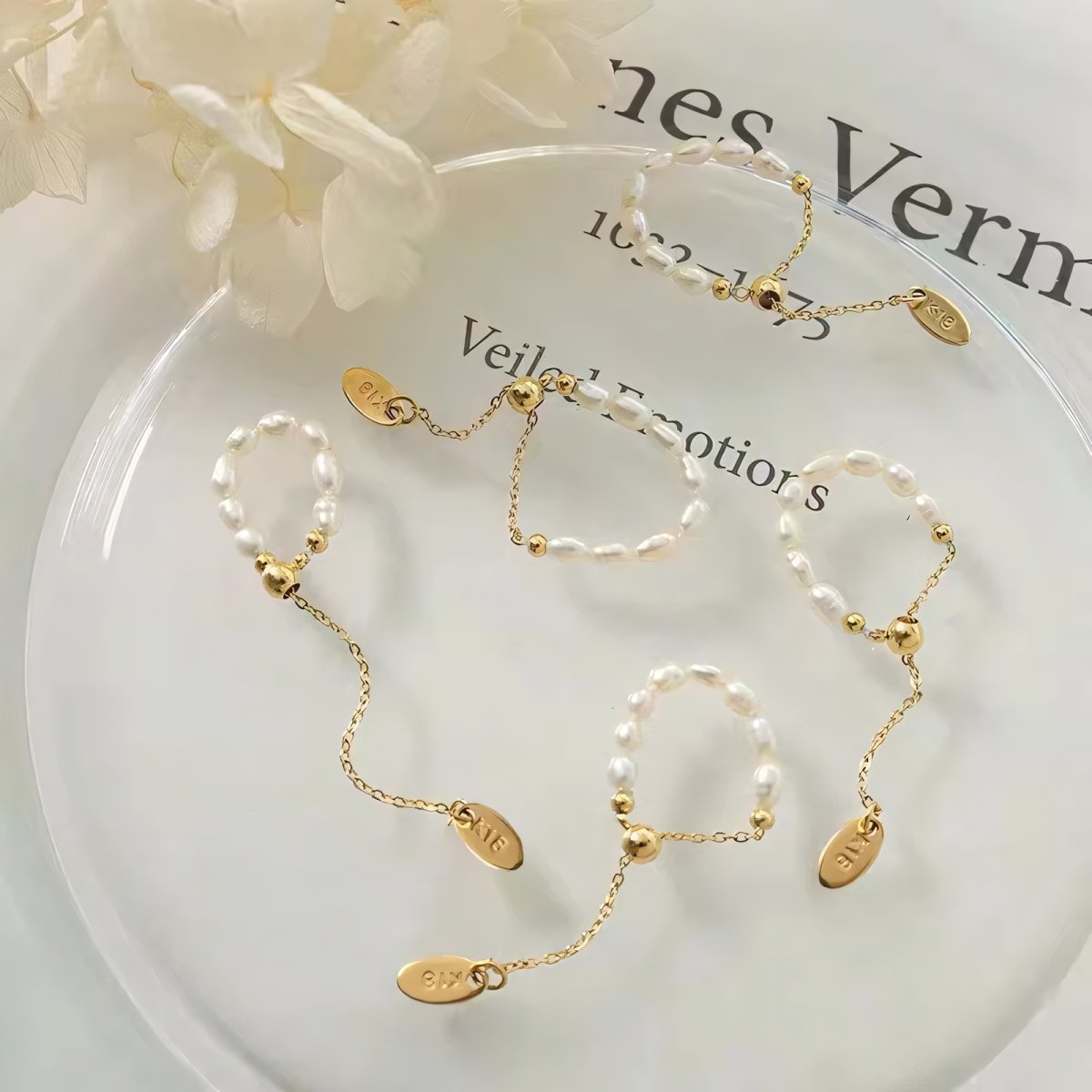 Elegant White Pearl Drop Chain Ring