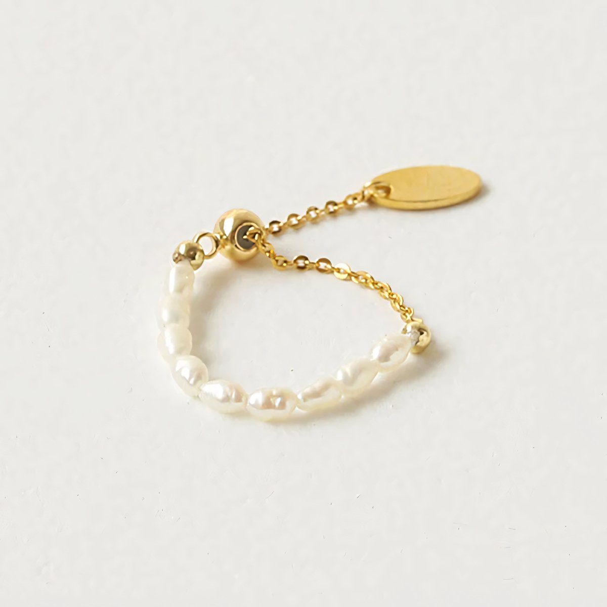 Elegant White Pearl Drop Chain Ring