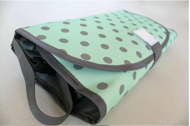 Portable 3-in-1 Changing Pad with Sanitizer